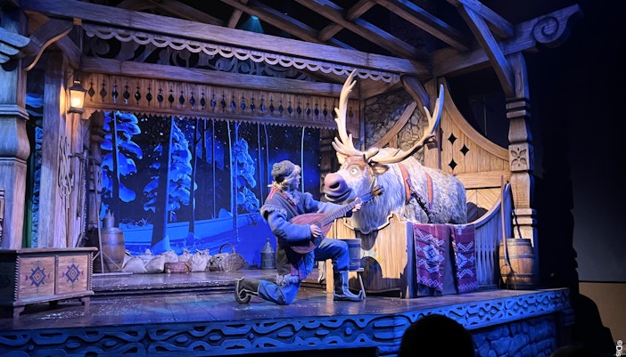 Elsa and Anna performing on stage at Disneyland Paris during Frozen: A Musical Invitation.