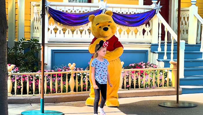 Winnie the Pooh meeting children at Disneyland Paris.